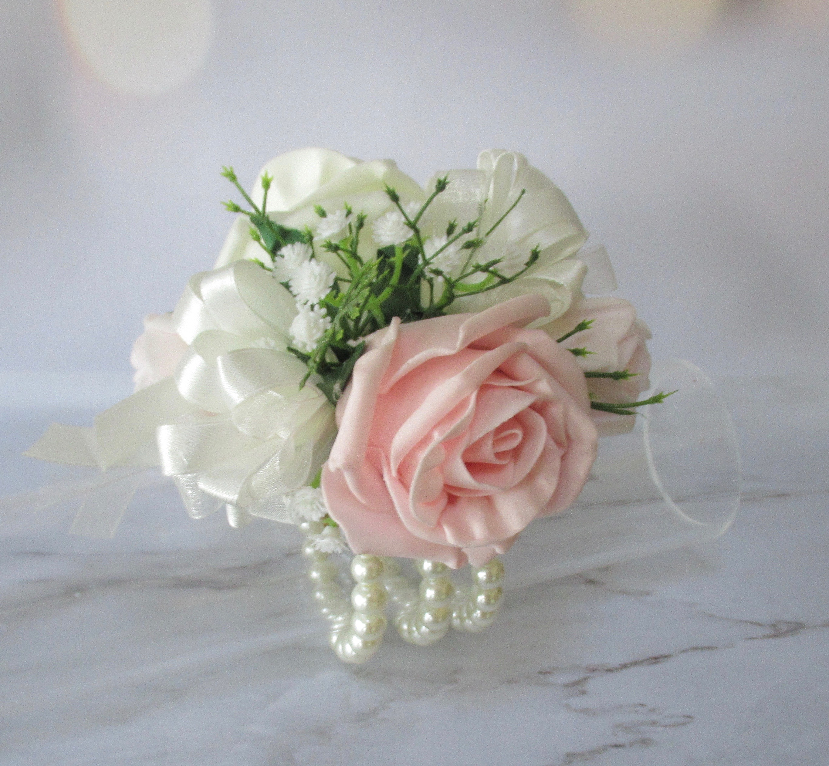 Pink and ivory prom corsage